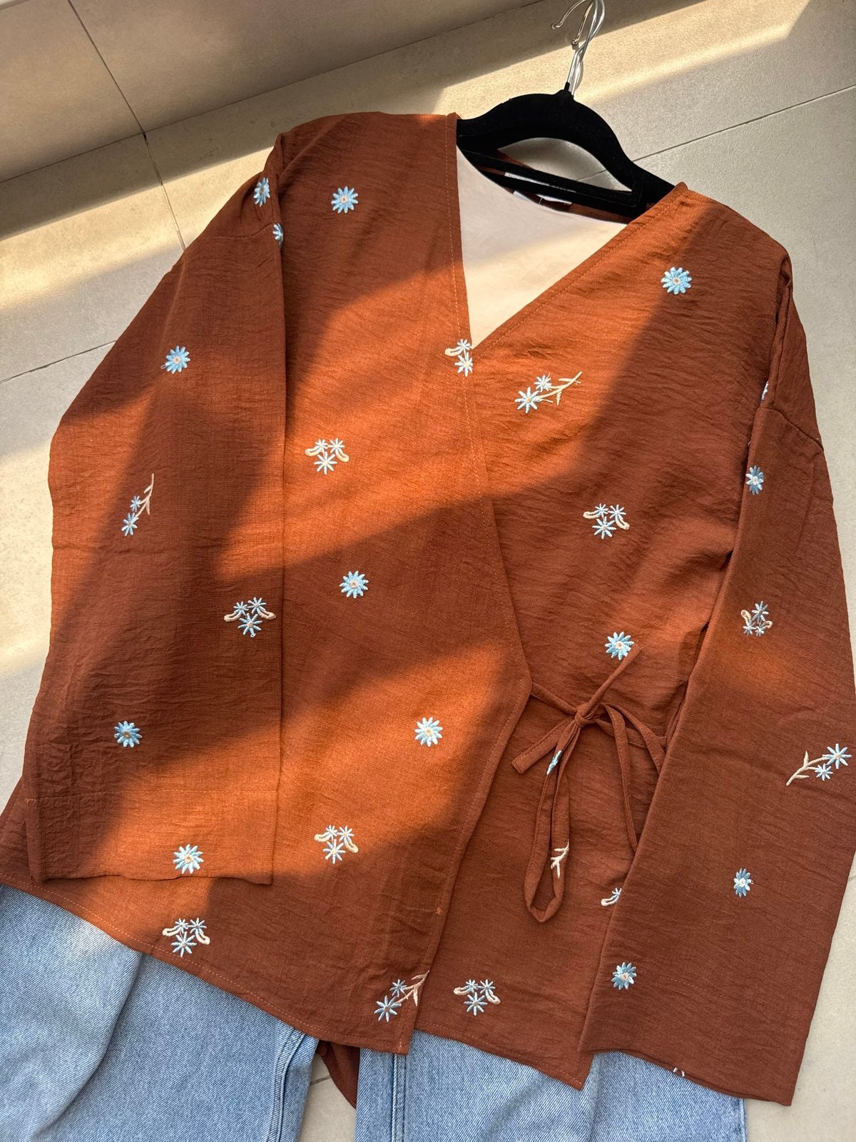 Ella’s Embroidered Linen Wrap Blouse