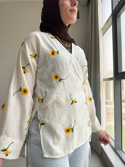 Ella’s Embroidered Linen Wrap Blouse